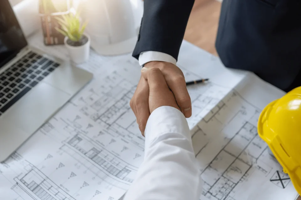 Procurement team at Hernandez Development & Construction managing contracts and coordinating with trade partners